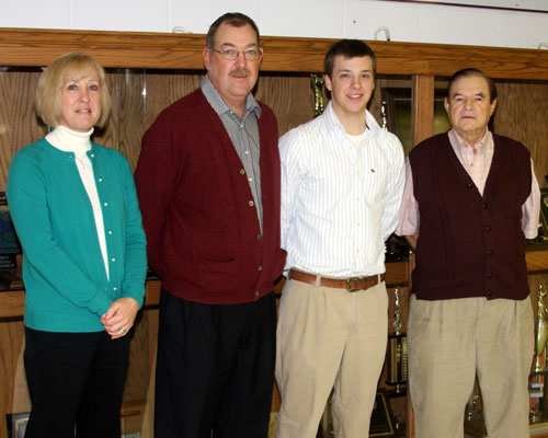 Liberty Magnet Tech's Grant Griffin is joined by his parents, Carey and Debbie, and Coach Dr. Jerry Wilcoxson